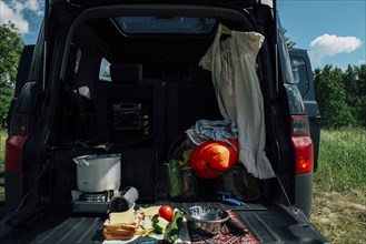 Food and camping gear in car