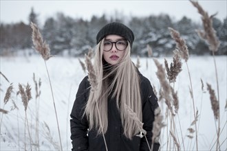 Wind blowing hair of Asian woman in winter