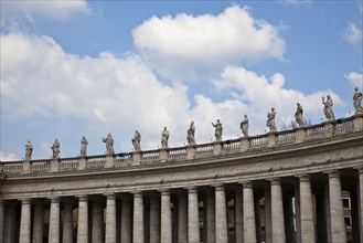 Statues on columned building