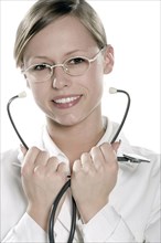 Hispanic doctor holding stethoscope