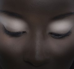 Close up of woman wearing eyeshadow