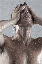 Caucasian man showering