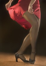 Low section of woman dancing
