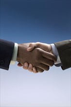 Close up of businessman's handshake