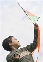 Boy preparing to fly kite
