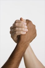 Close up of two hands in arm wrestle