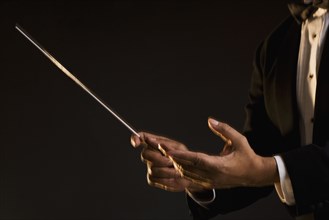 Close up of hands conducting