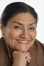 Close up of senior Hispanic woman smiling