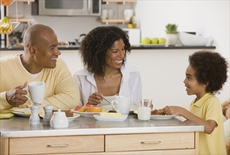 African family eating breakfast