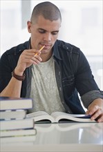 Hispanic man studying