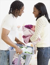 African couple doing laundry
