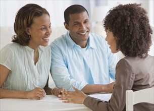 African couple receiving financial consultation