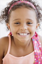 Close up of mixed race girl smiling