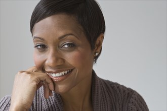 Confident African woman smiling