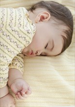 Mixed race baby girl sleeping