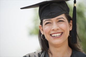 Smiling Hispanic graduate