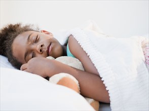 Mixed race girl sleeping