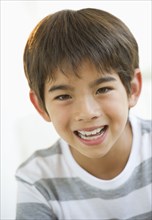 Close up of smiling mixed race boy