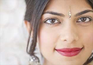 Indian woman with bindi on forehead