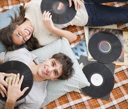Couple listening to vinyl records together