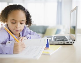 African American girl doing homework