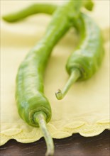 Close up of green chili peppers