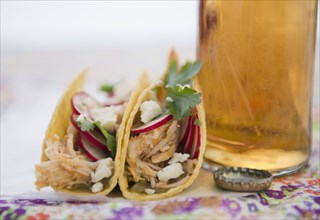 Beer and Mexican chicken tacos