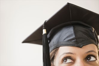 Cape Verdean woman in graduation cap