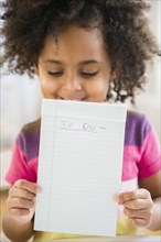 African American girl holding to do list