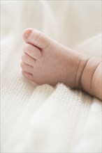 Close up of Hispanic infant's foot