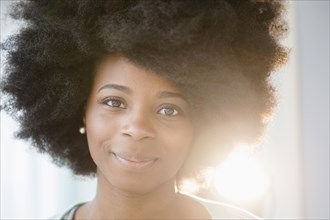 Mixed race woman smiling