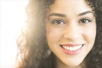 Mixed race woman smiling