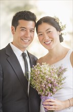 Newlywed couple smiling