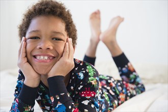 Black boy smiling in pajamas