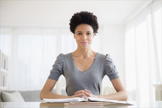 Black woman working at desk