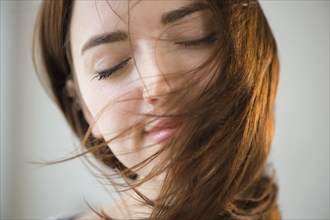 Woman's hair blowing in wind