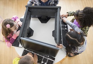 Children using computers in classroom