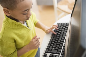 African American boy using computer