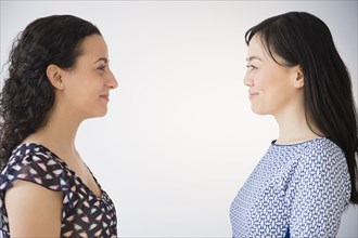 Women smiling at each other