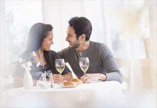 Couple having dinner together in restaurant