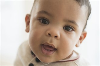 Close up of mixed race baby's face
