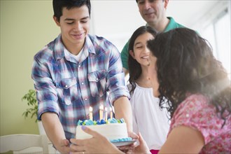 Hispanic family celebrating birthday together