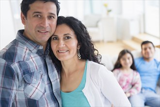 Hispanic family smiling together
