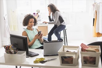 Businesswomen working at desks in office