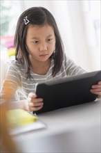 Chinese student using digital tablet