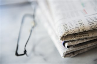 Close up of business newspaper with stocks