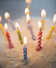 Close up of birthday candles in cake