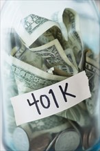 Close up of 401K savings jar