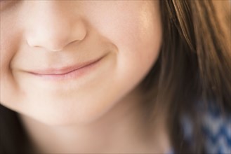 Close up of mouth of smiling girl