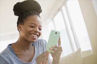 Black woman using cell phone